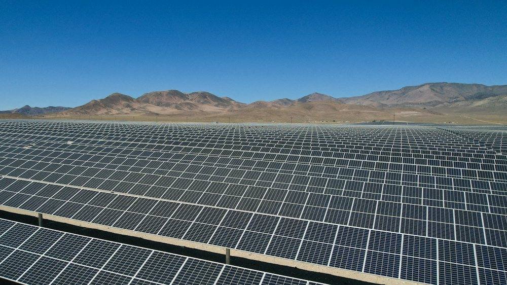 Large array of solar panels in a desert